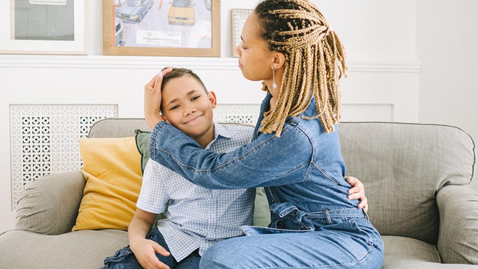 A parent hugging a child at home