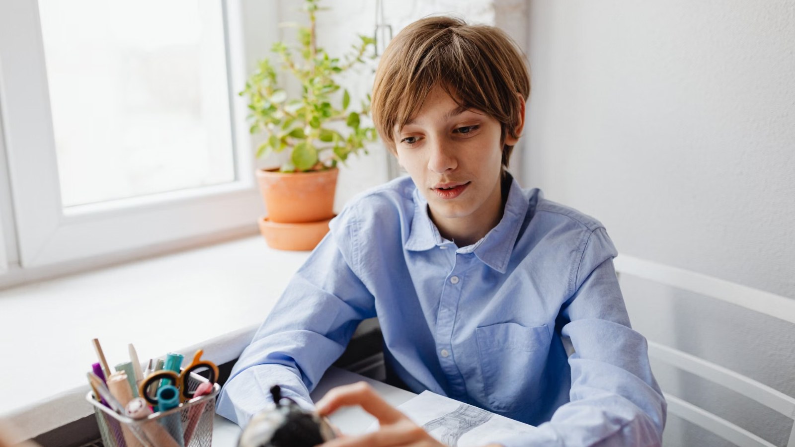 A boy working at a desk