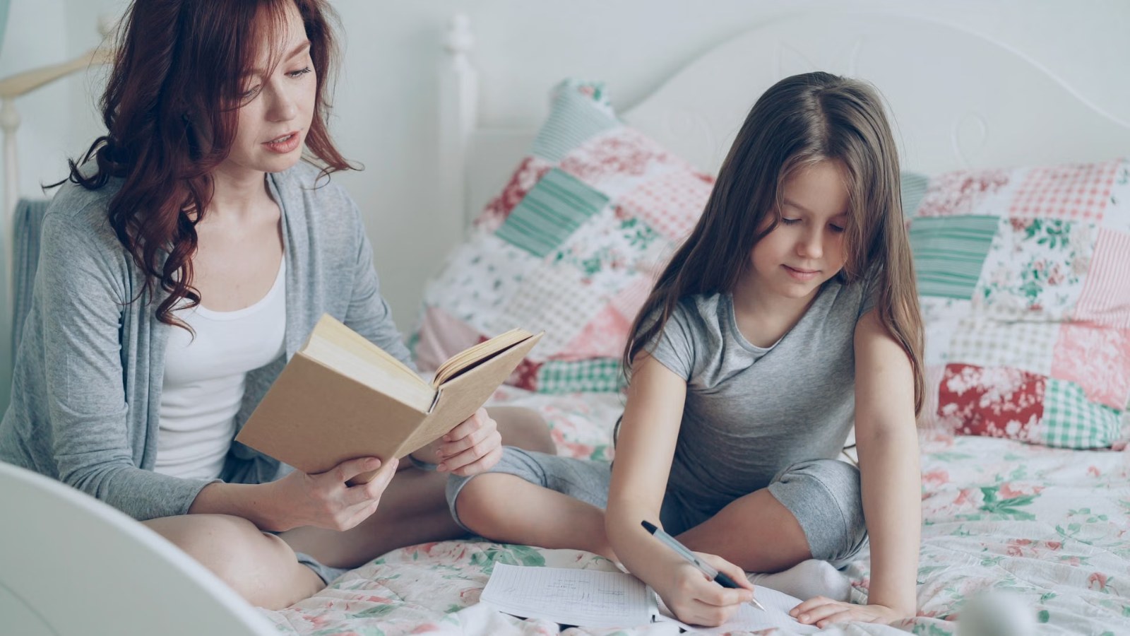 A parent and child reading together